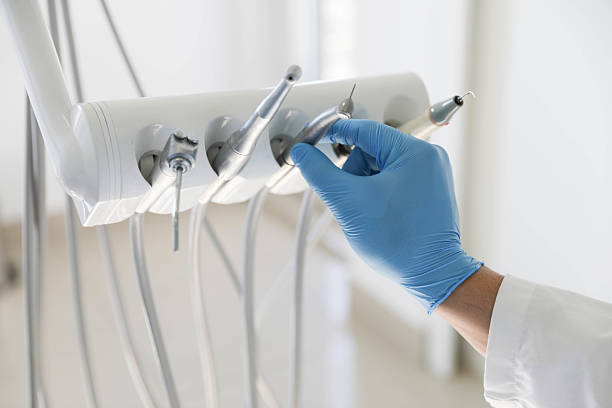 Professional Emergency Dentist technician working in Petersburg, IN